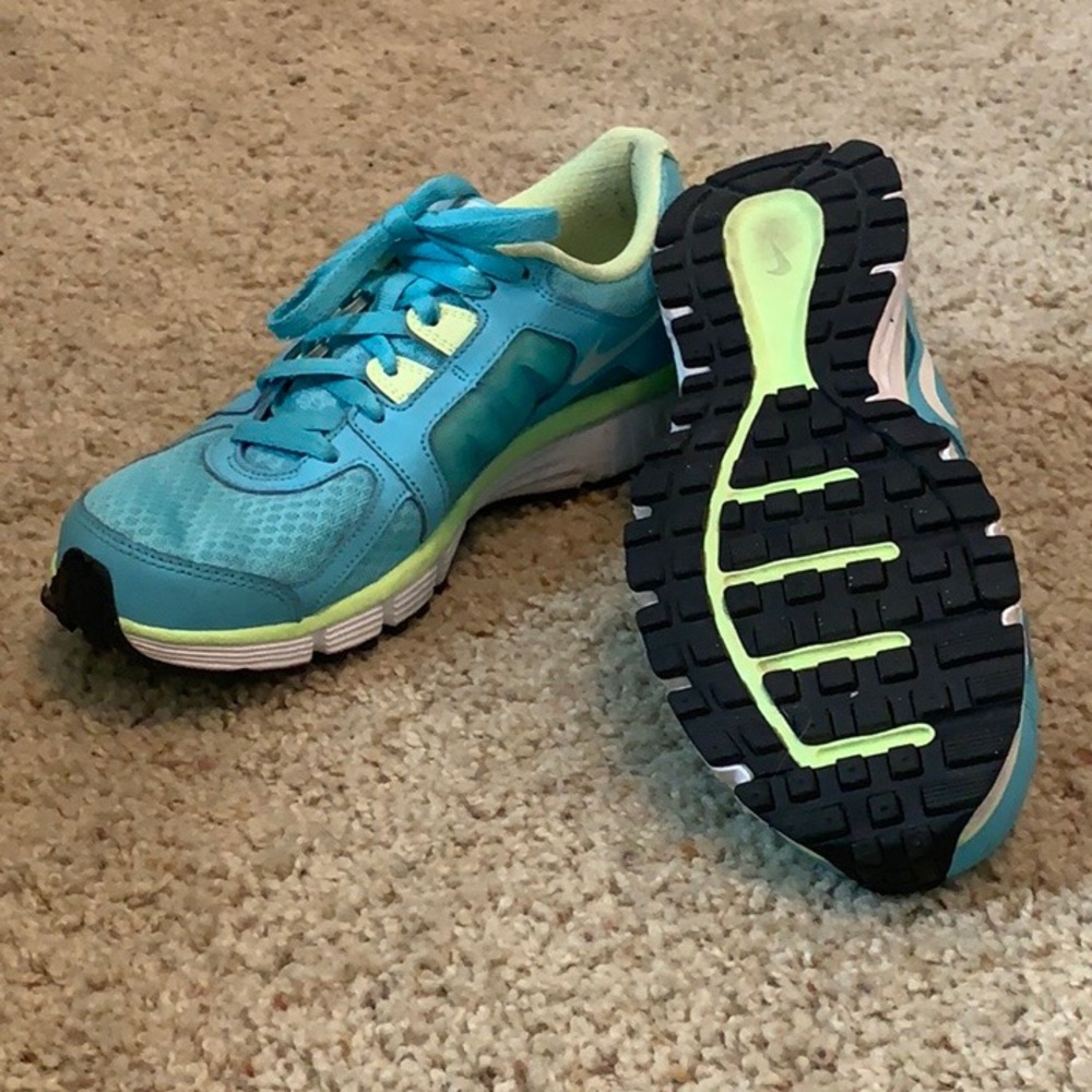 Turquoise and lime green Nike’s